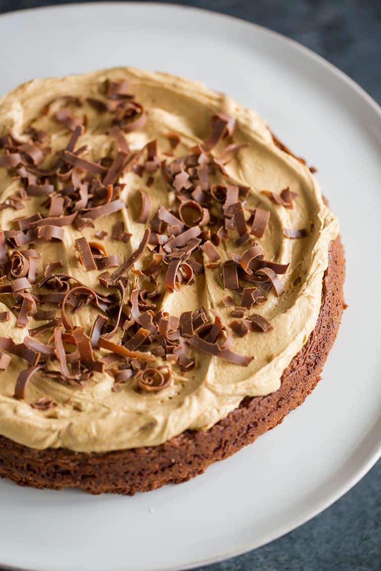 An overhead shot of brownie cake with cookie butter frosting.