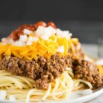 A plate of Cincinnati chili five way.