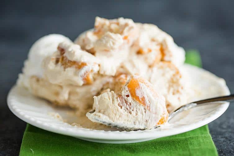 A big scoop of coffee and doughnuts trifle on a plate.