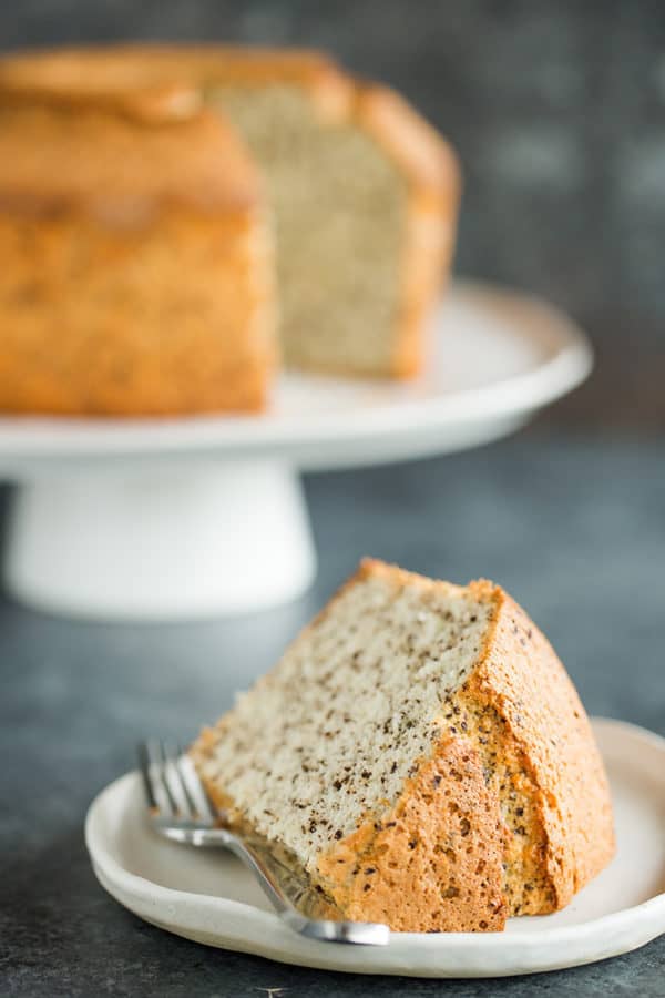 A slice of chocolate chip chiffon cake on its side.