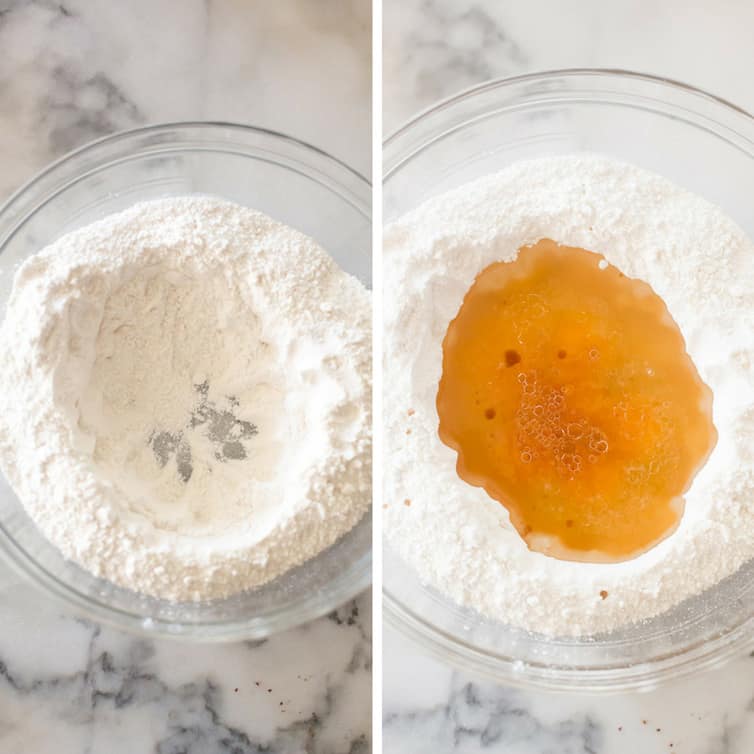 A bowl of flour with a well in the center, and the well filled with ingredients.