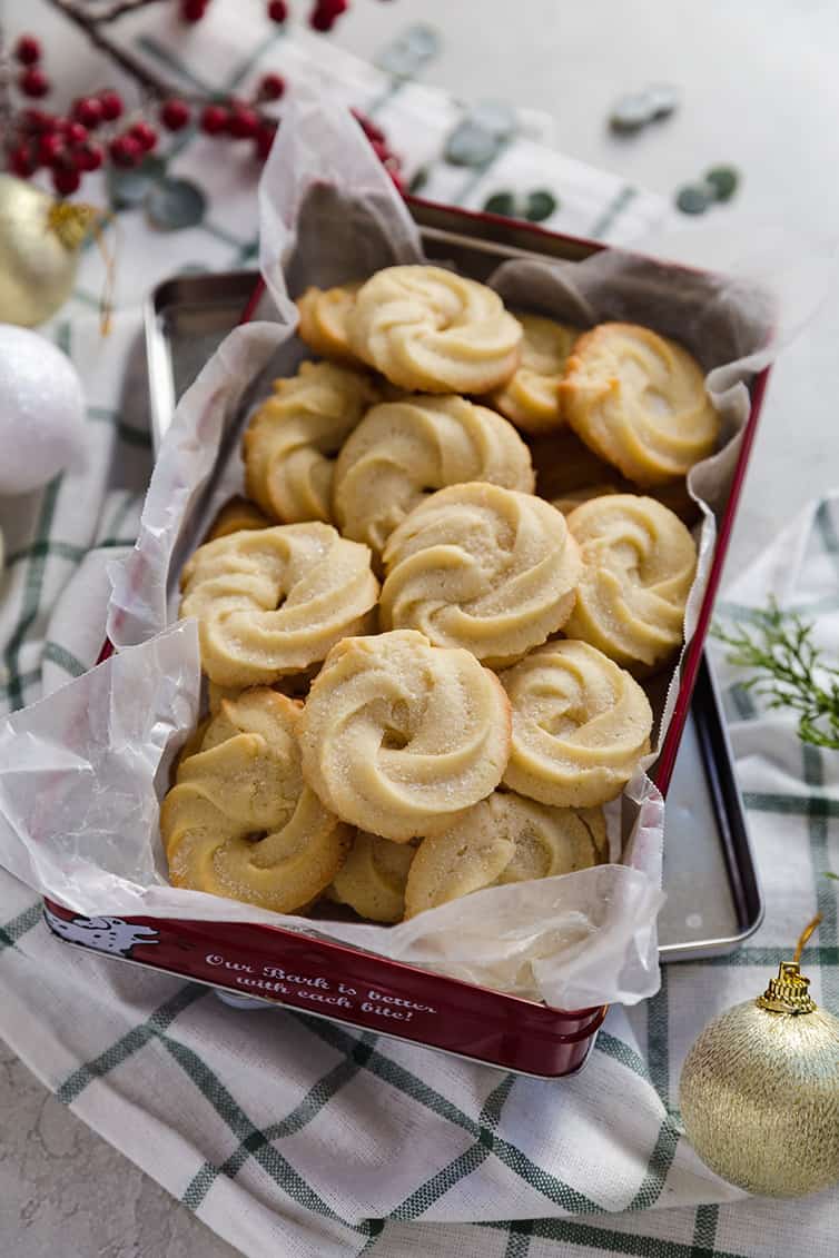 A red tin filled with Danish butter cookies.