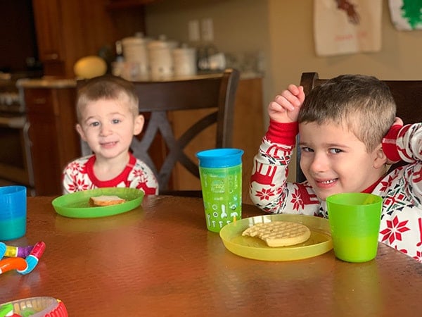 Dominic and Joseph eating breakfast.