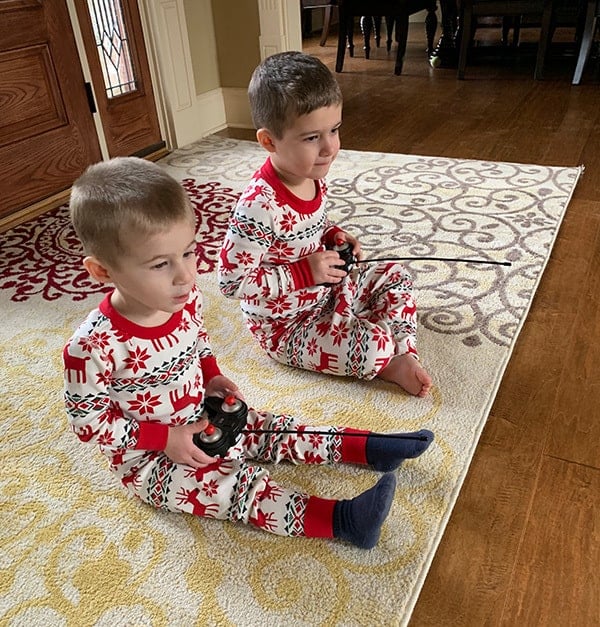 Dominic and Joseph playing with remote control cars.