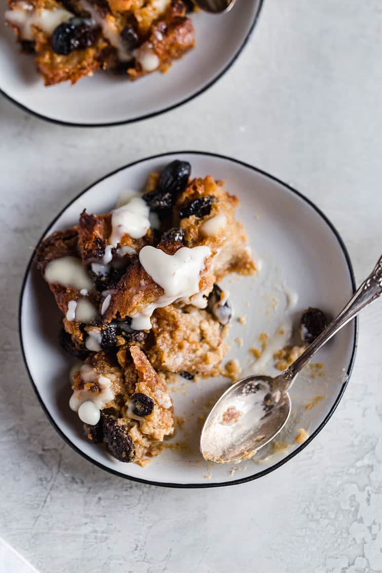 A plate of bread pudding half-eaten.