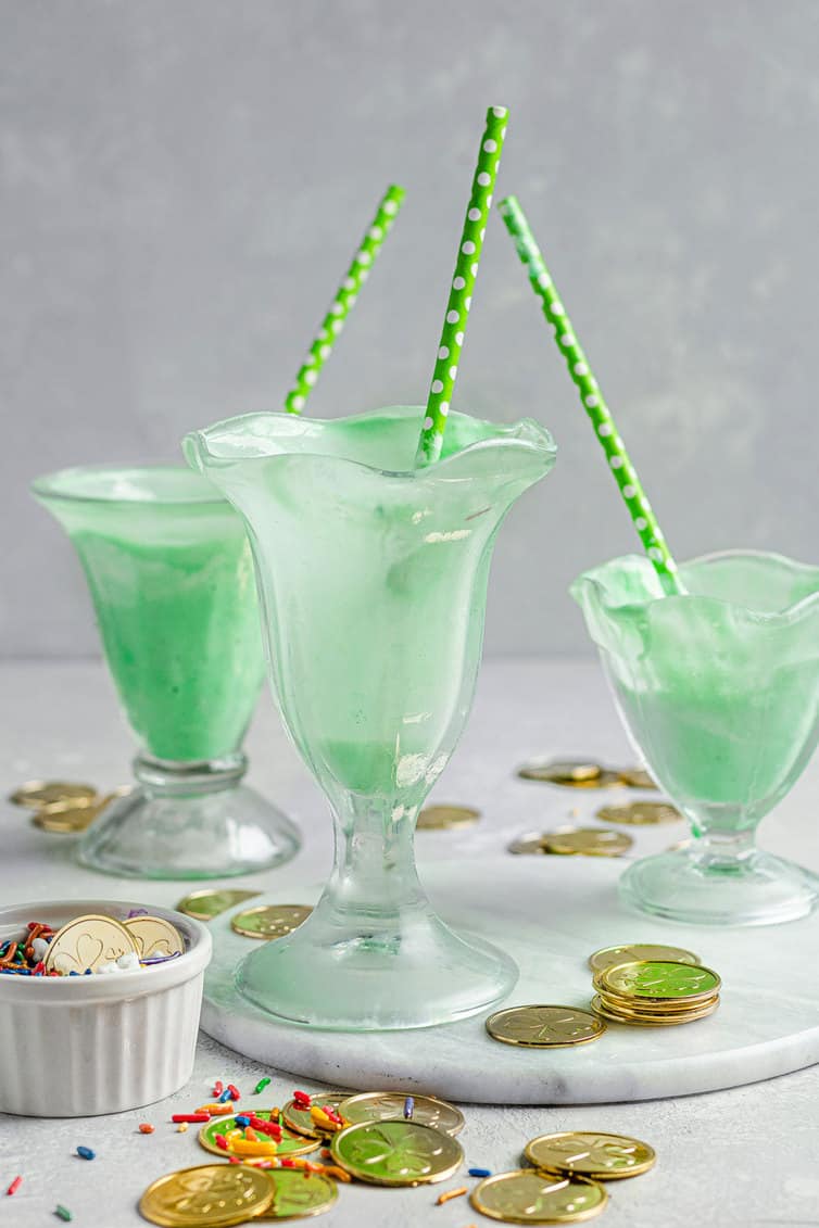 Three empty milkshake glasses