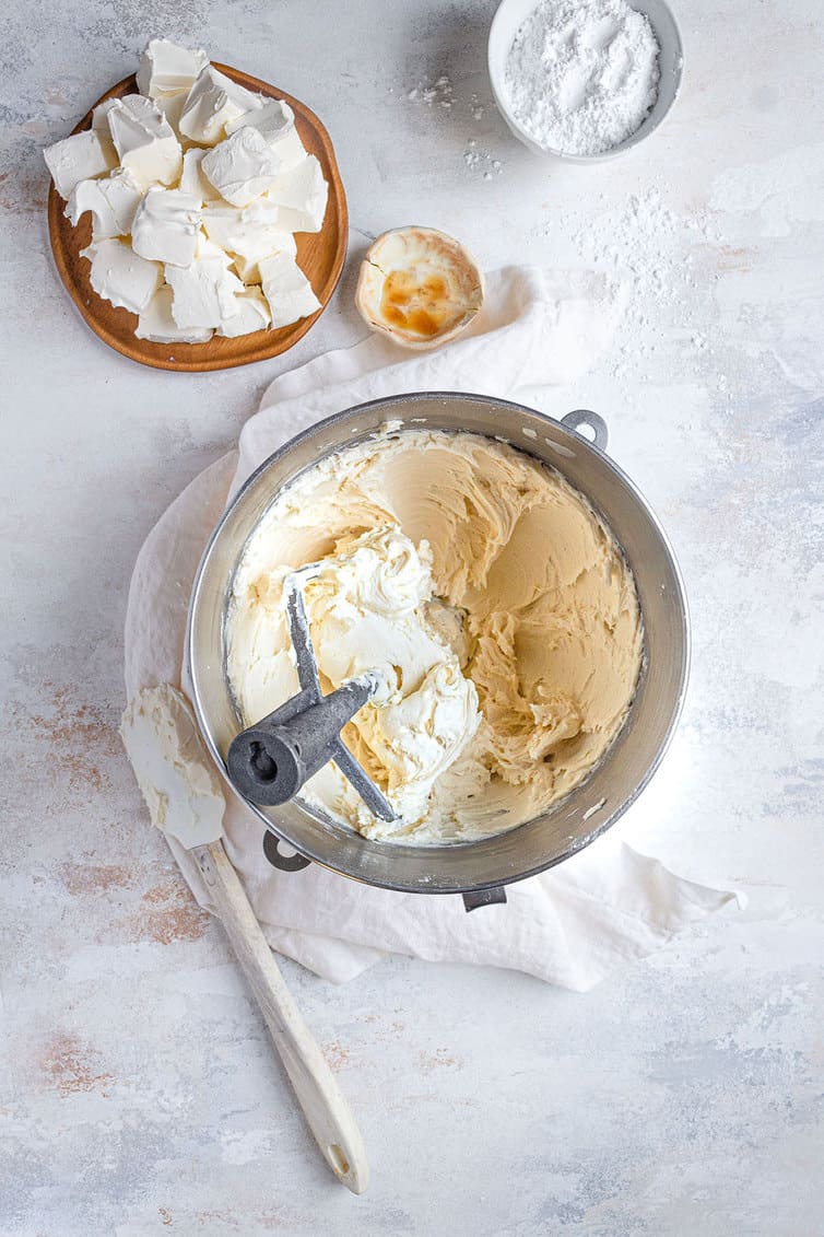 Cream cheese frosting in a mixing bowl.