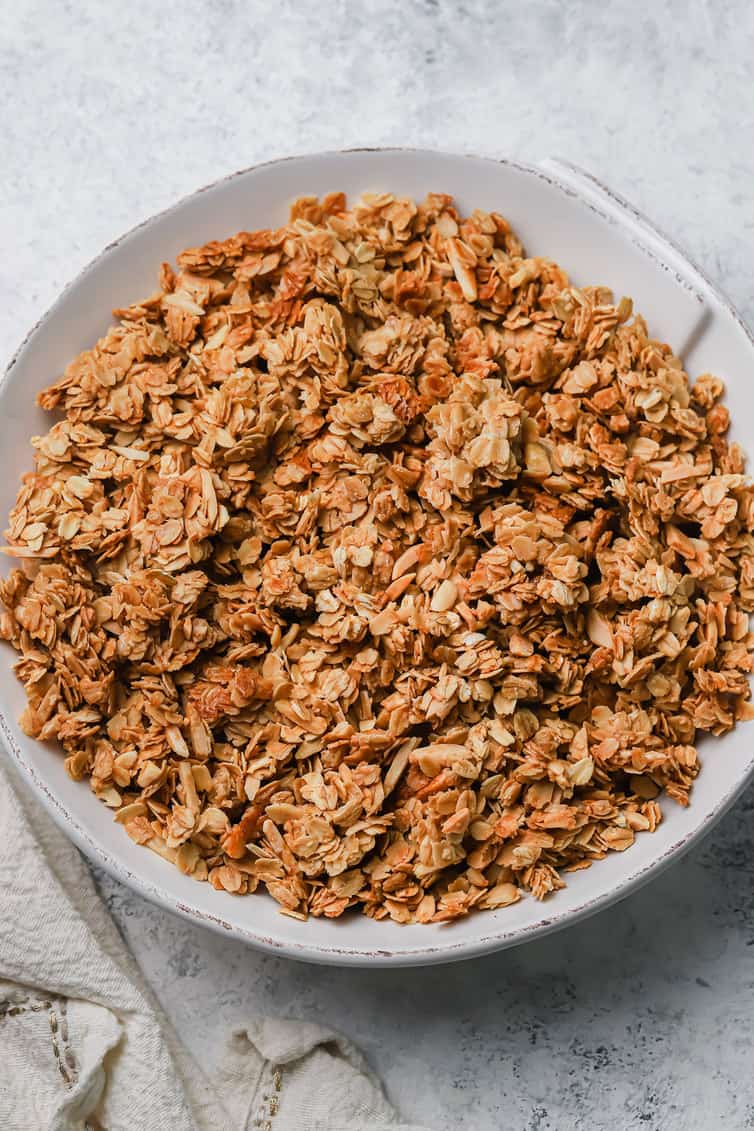 A bowl of baked granola in a bowl.