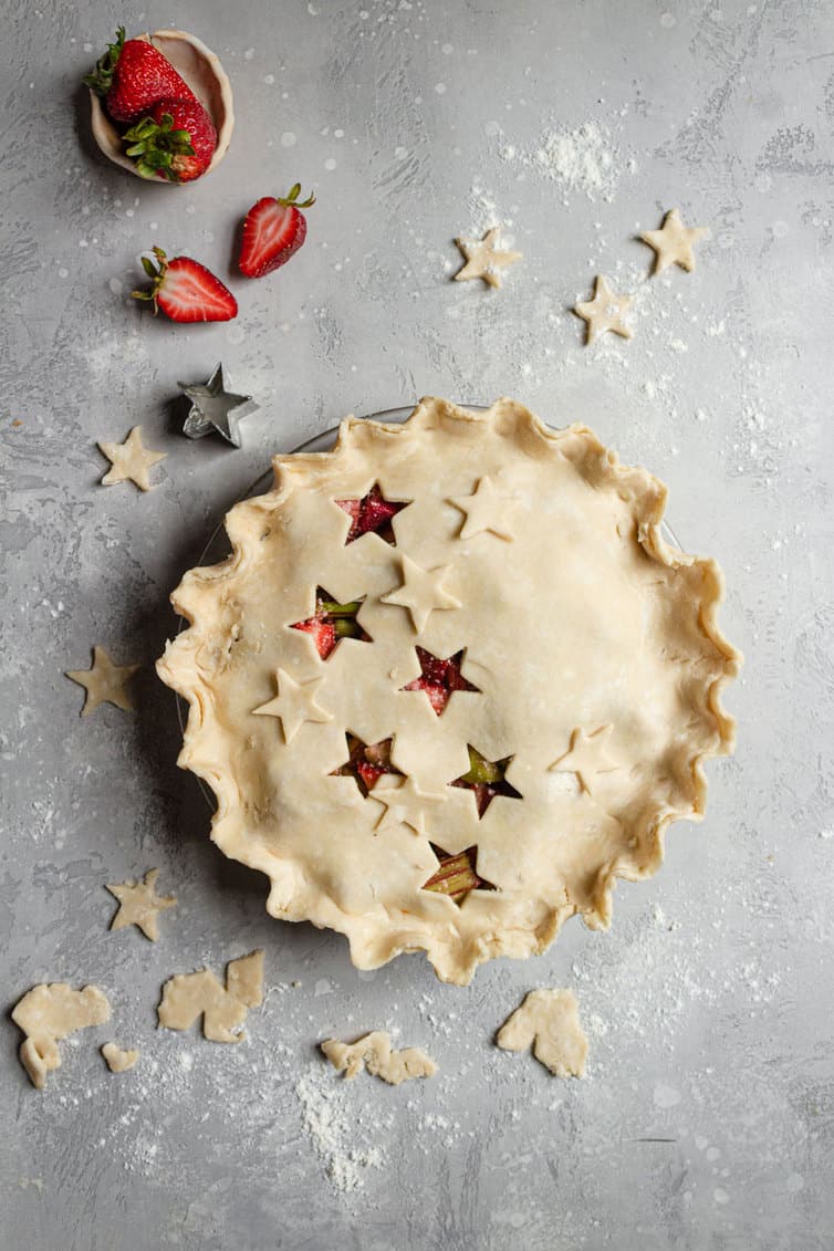 Assembled strawberry rhubarb pie before baking.