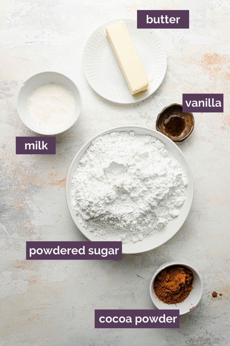 Ingredients for Texas sheet cake frosting prepped in bowls.
