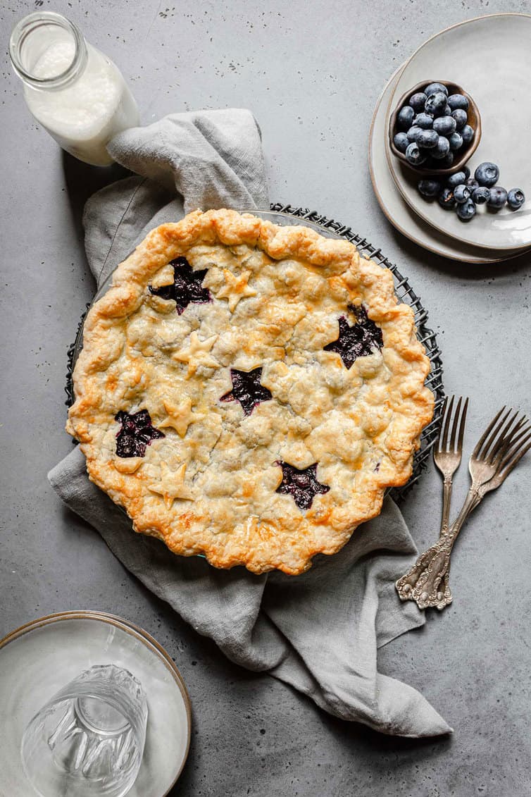 Overhead photo of whole baked blueberry pie.