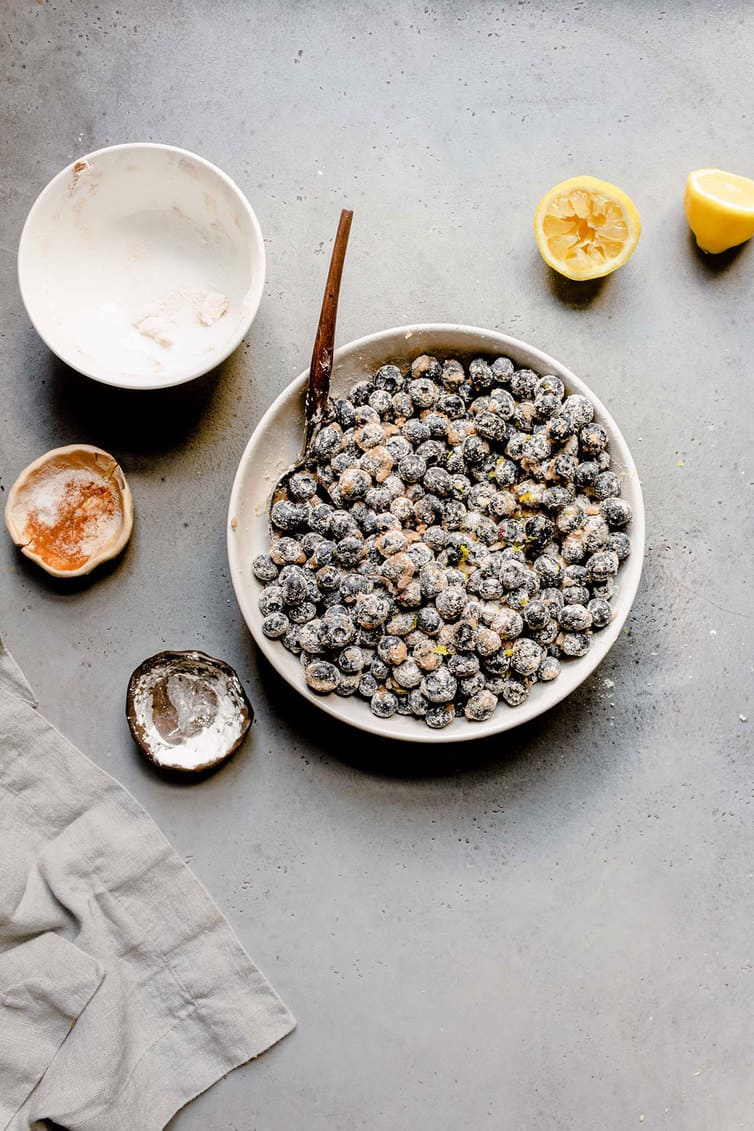 Blueberry pie filling mixed together in a bowl.