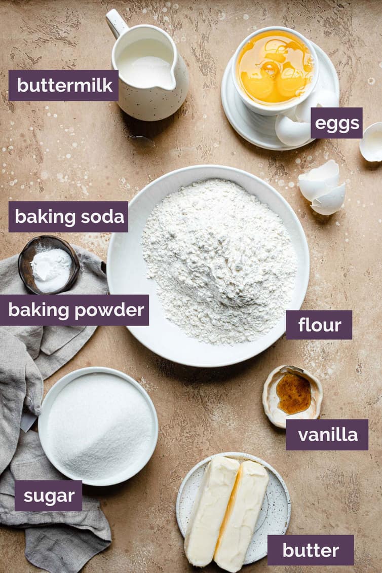 Ingredients for butter cake prepped in bowls on counter.