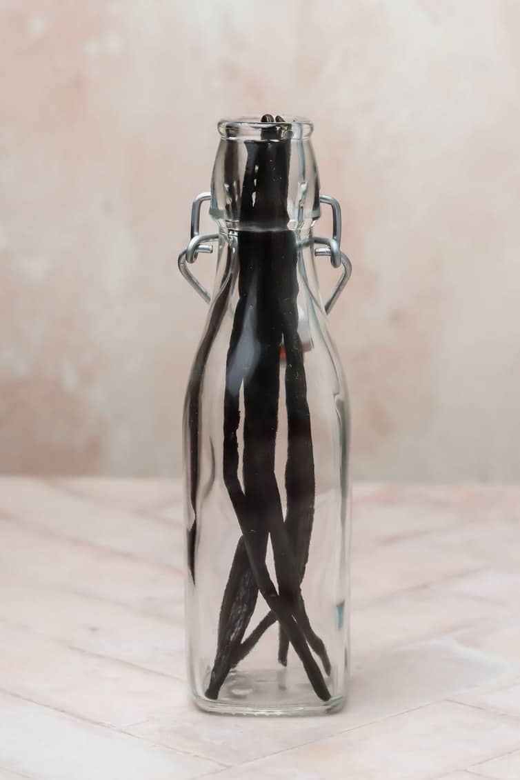 Vanilla beans in a glass bottle.