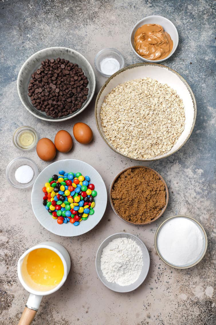 Ingredients for monster cookies prepped in bowls.
