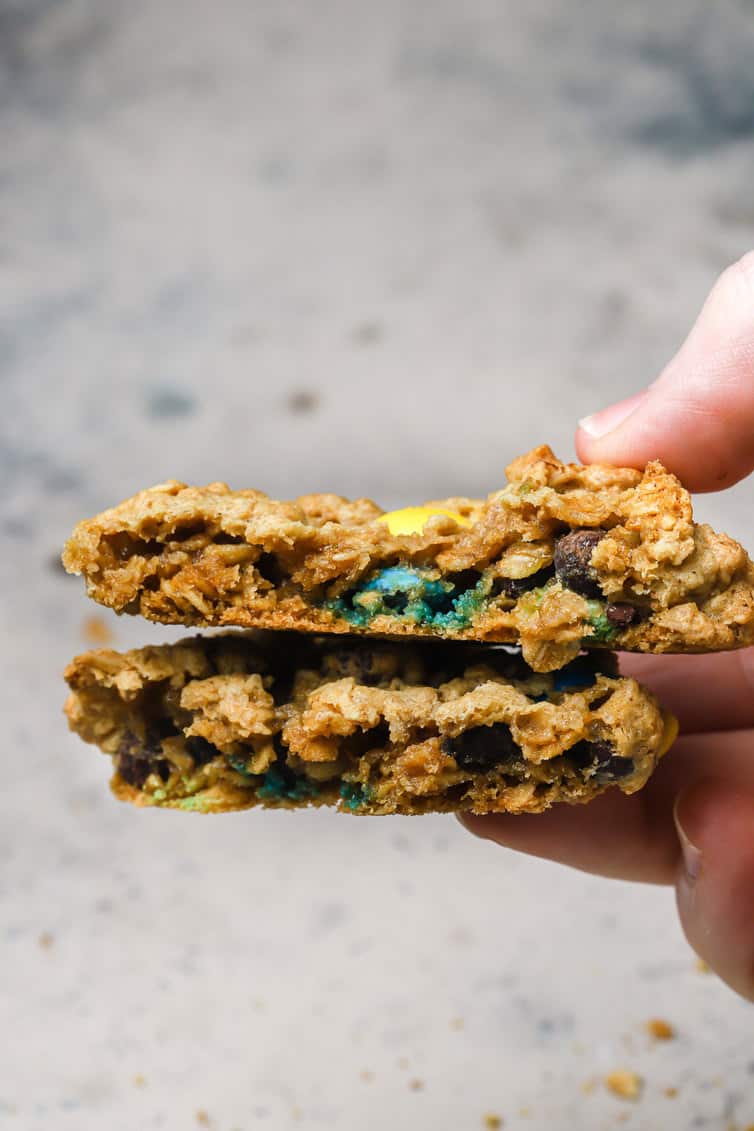 A cookie broken in half and the halves stacked together.