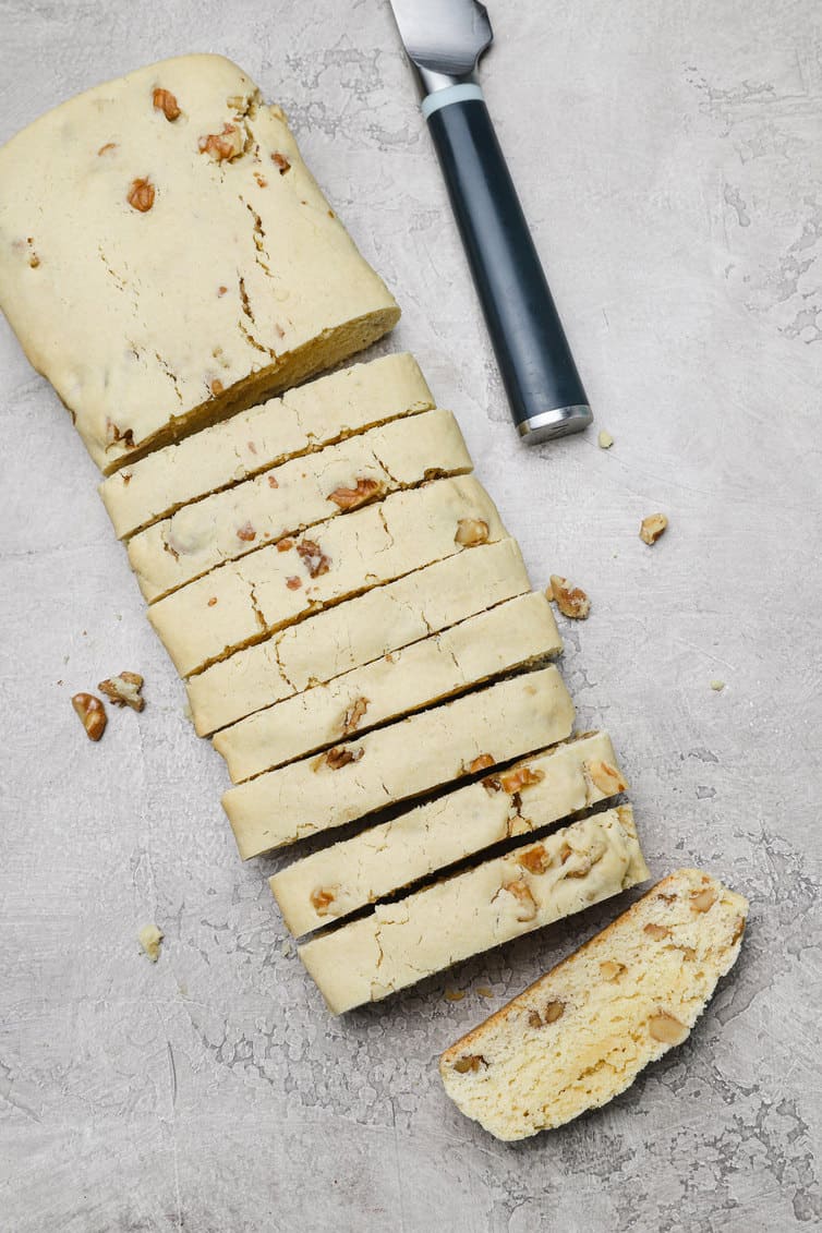 Overhead photo of one log of biscotti sliced.