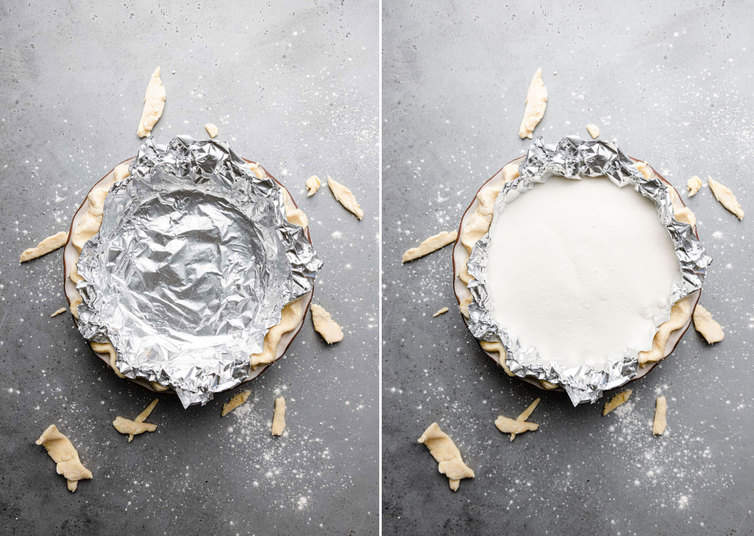 Pie dough covered in foil and filled with sugar.