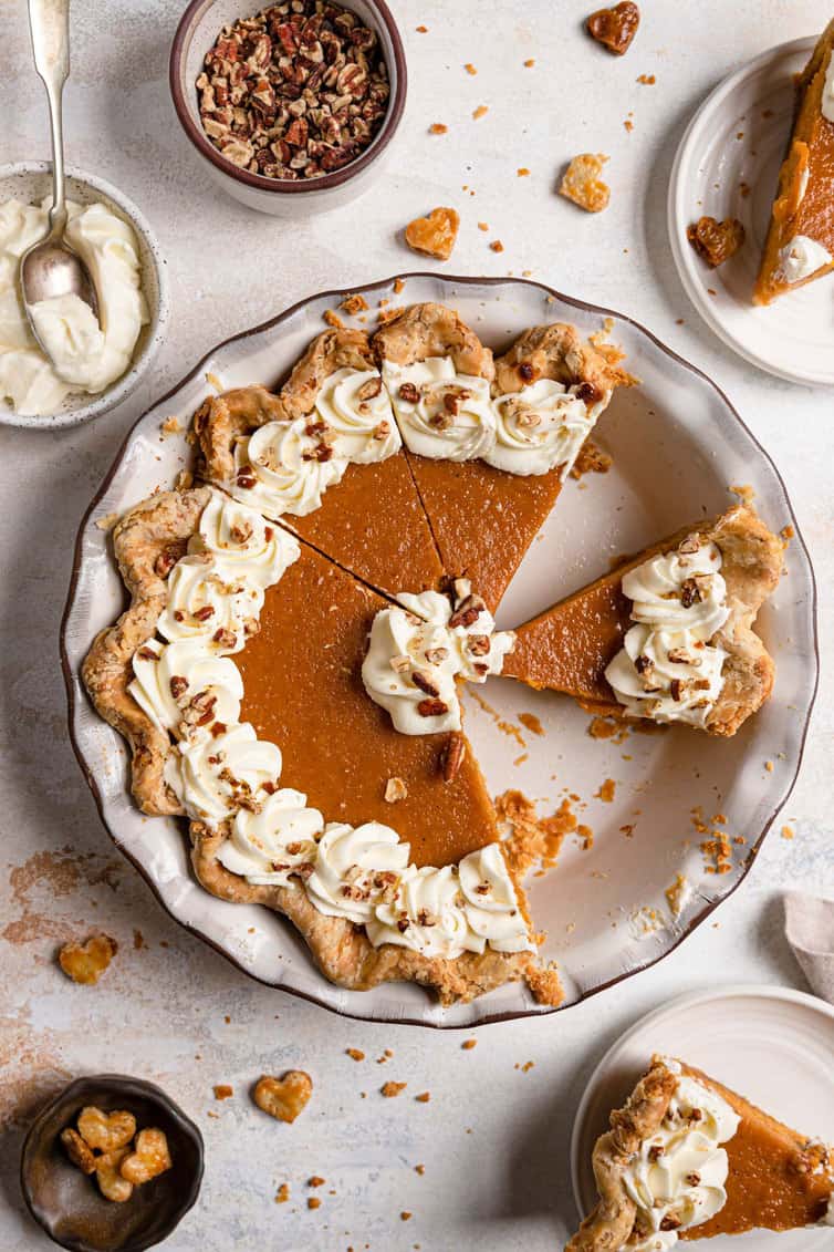 Overhead photo of sweet potato pie with two slices removed.