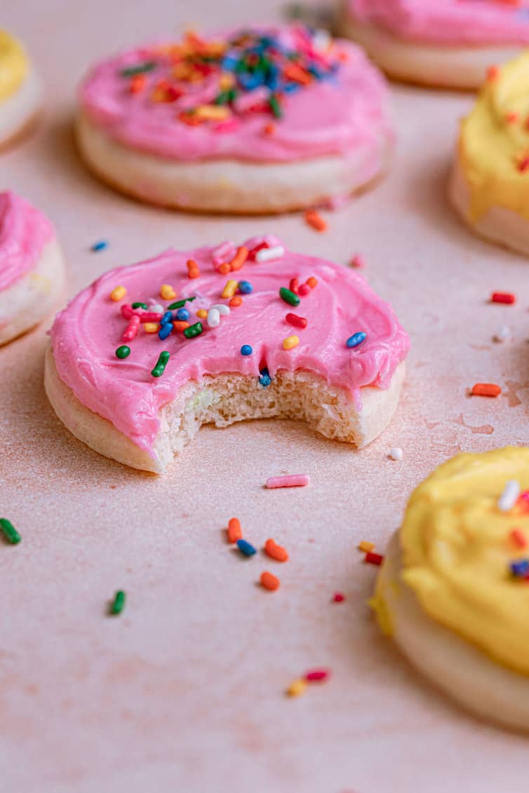 Lofthouse cookie on a counter with a bite taken out.