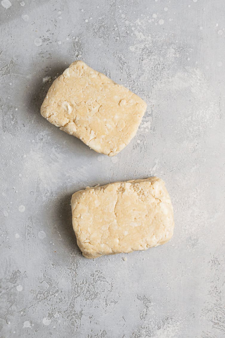 Pop tart pastry dough in two rectangles on a lightly floured counter.