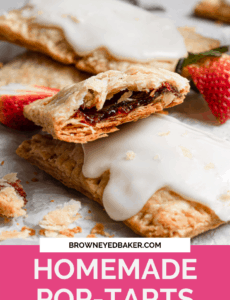 Half of a strawberry pop tart on top of iced strawberry pop tarts with a pink rectangle at the bottom that says Homemade Pop-Tarts.