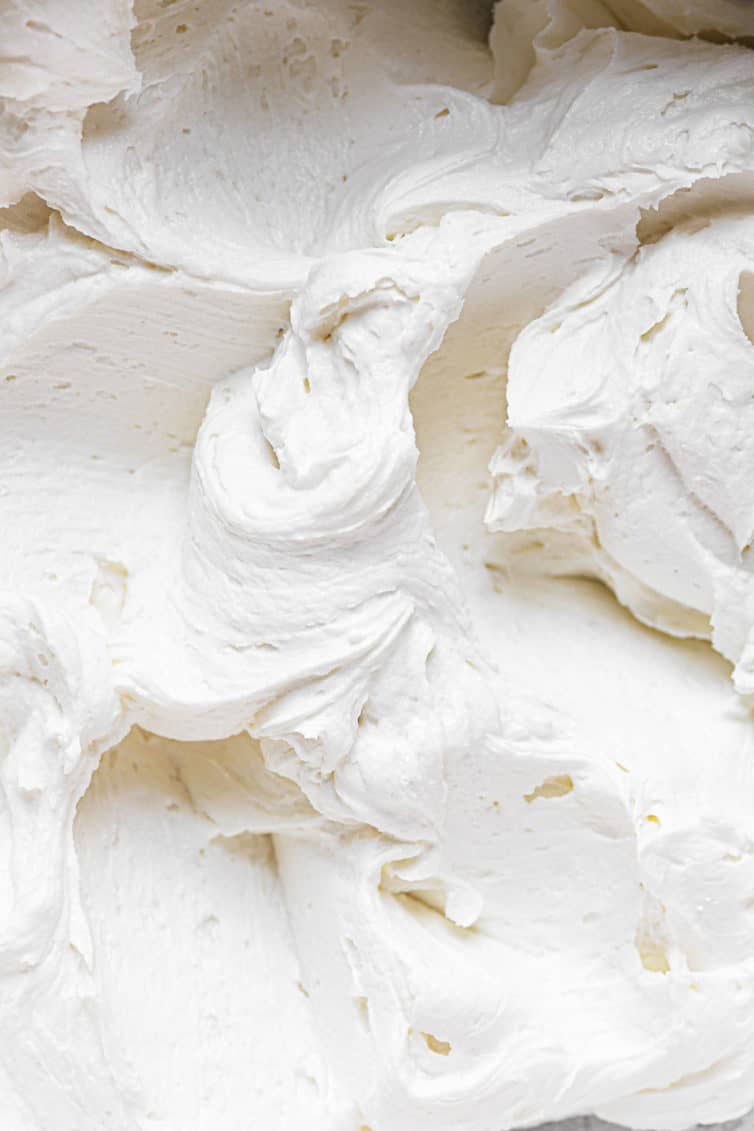 Swirls of vanilla buttercream frosting.