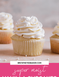 A vanilla cupcake topped with vanilla frosting with sprinkles and a pink rectangle at the bottom that says super moist vanilla cupcakes.