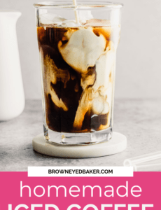 A glass of iced coffee with milk before stirring and the words homemade iced coffee at the bottom.