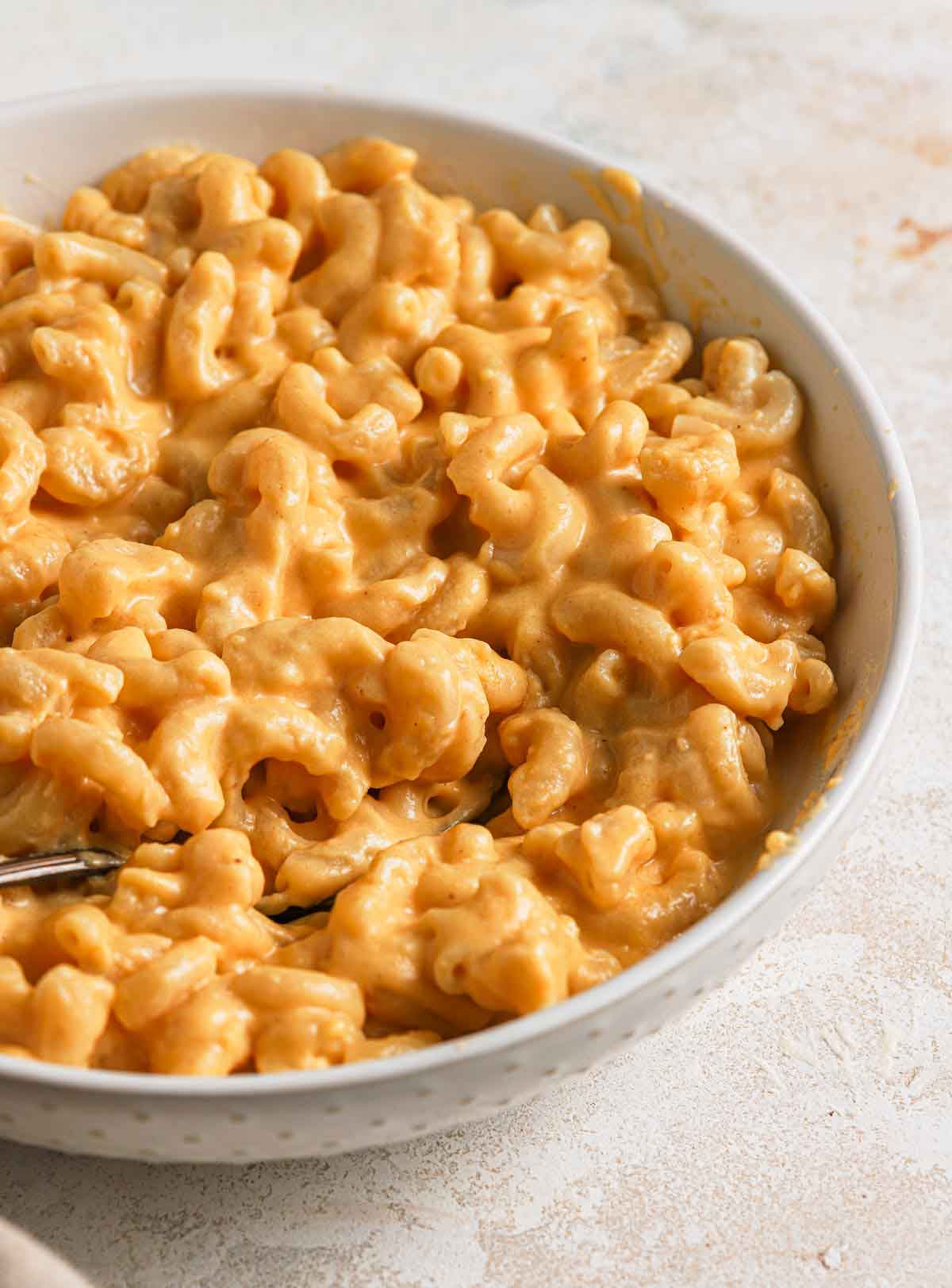 Close up photo of a bowl of stovetop mac and cheese.
