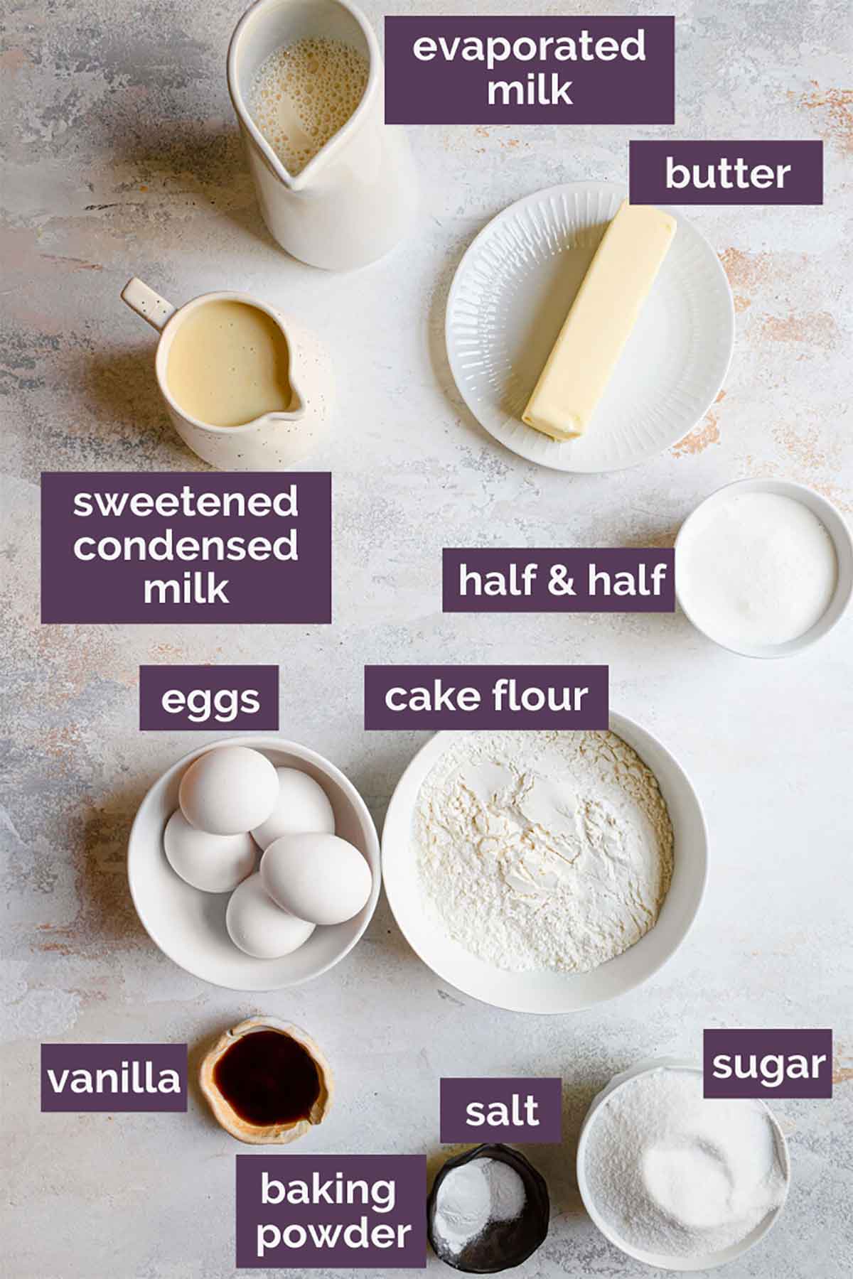 Ingredients for tres leches cake prepped and labeled.