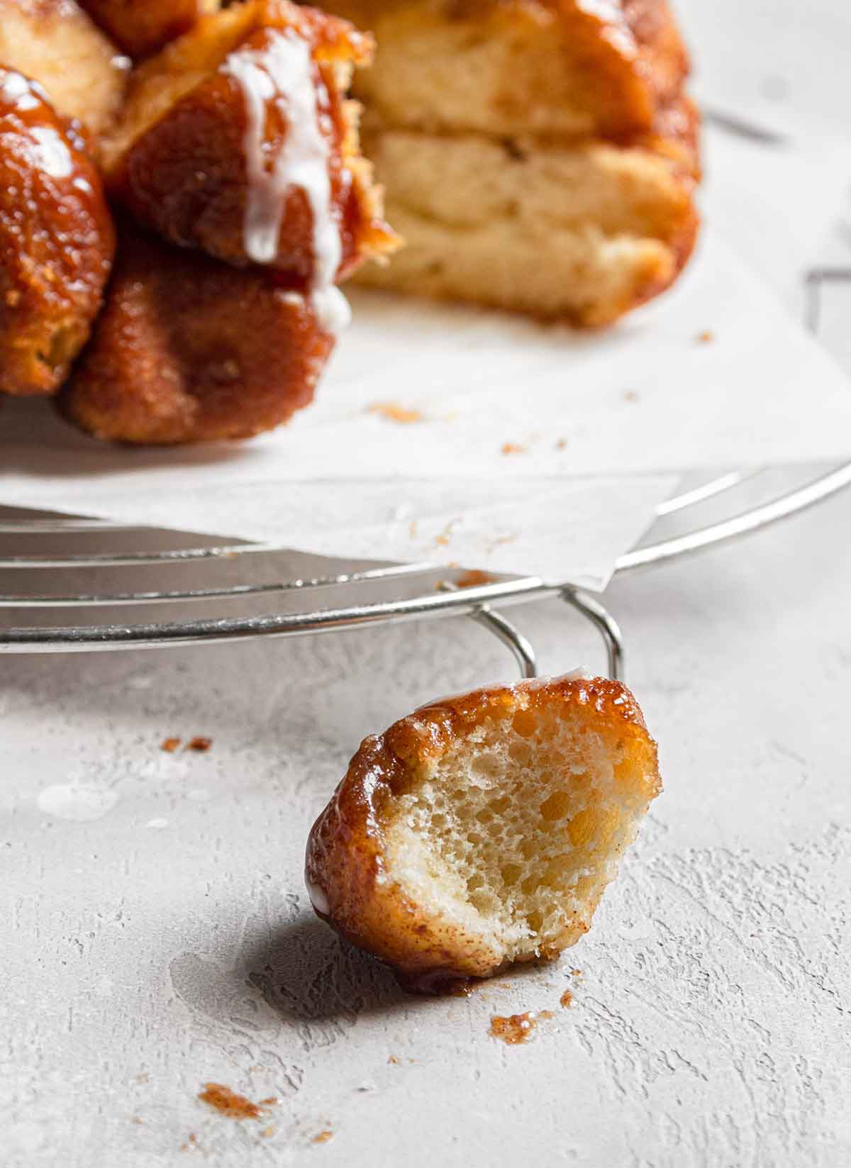 Close up photo of one piece of monkey bread, showcasing a light and airy dough.