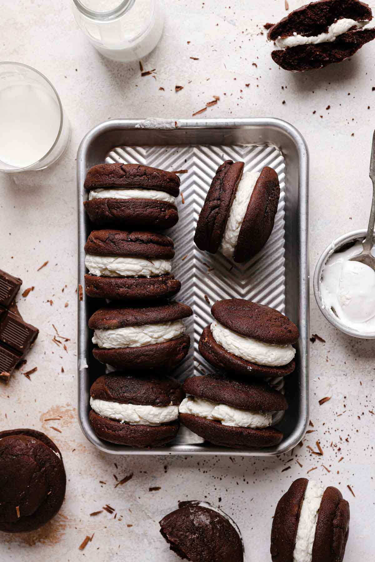 Overhead photo of assembled gobs standing on their sides in a metal baking dish.